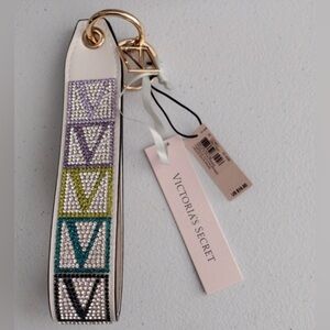 Victoria SecretWristlet Strap white with Multicolored Sparkle V Monogram NWT